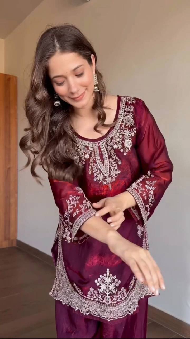 Elegance in maroon, where tradition meets modern style