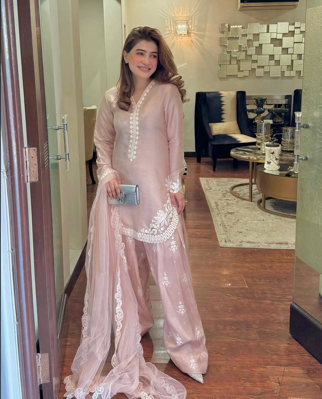 Chic Confidence: Embracing Style and Grace in a Striking Pink Ensemble