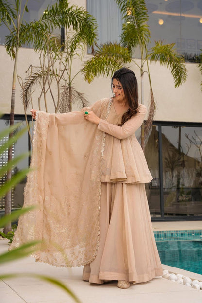 “Soft Peach Golden Embroidered Sharara Suit”