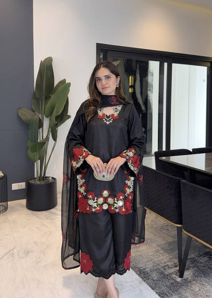 Elegant traditional outfit with floral embroidery showcasing grace, style, and modern sophistication