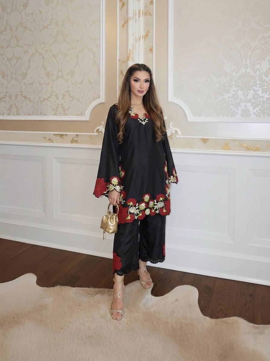 Elegant traditional outfit with floral embroidery showcasing grace, style, and modern sophistication