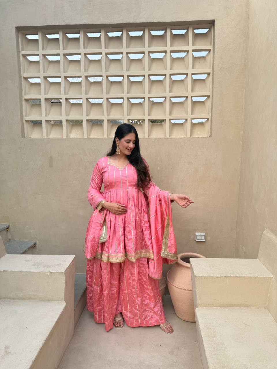 These outfits appear to be Anarkali Kurta Sets with Dupatta