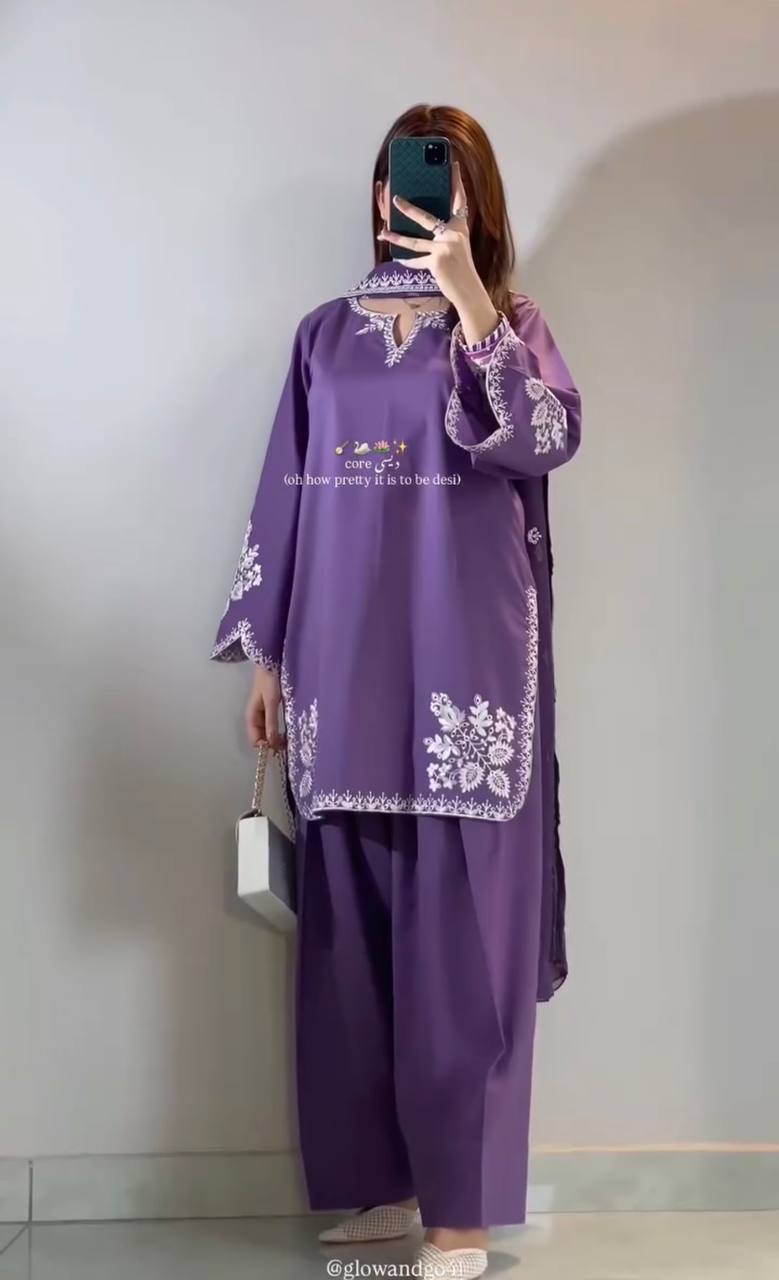 Graceful in purple, redefining elegance with modern ethnic charm