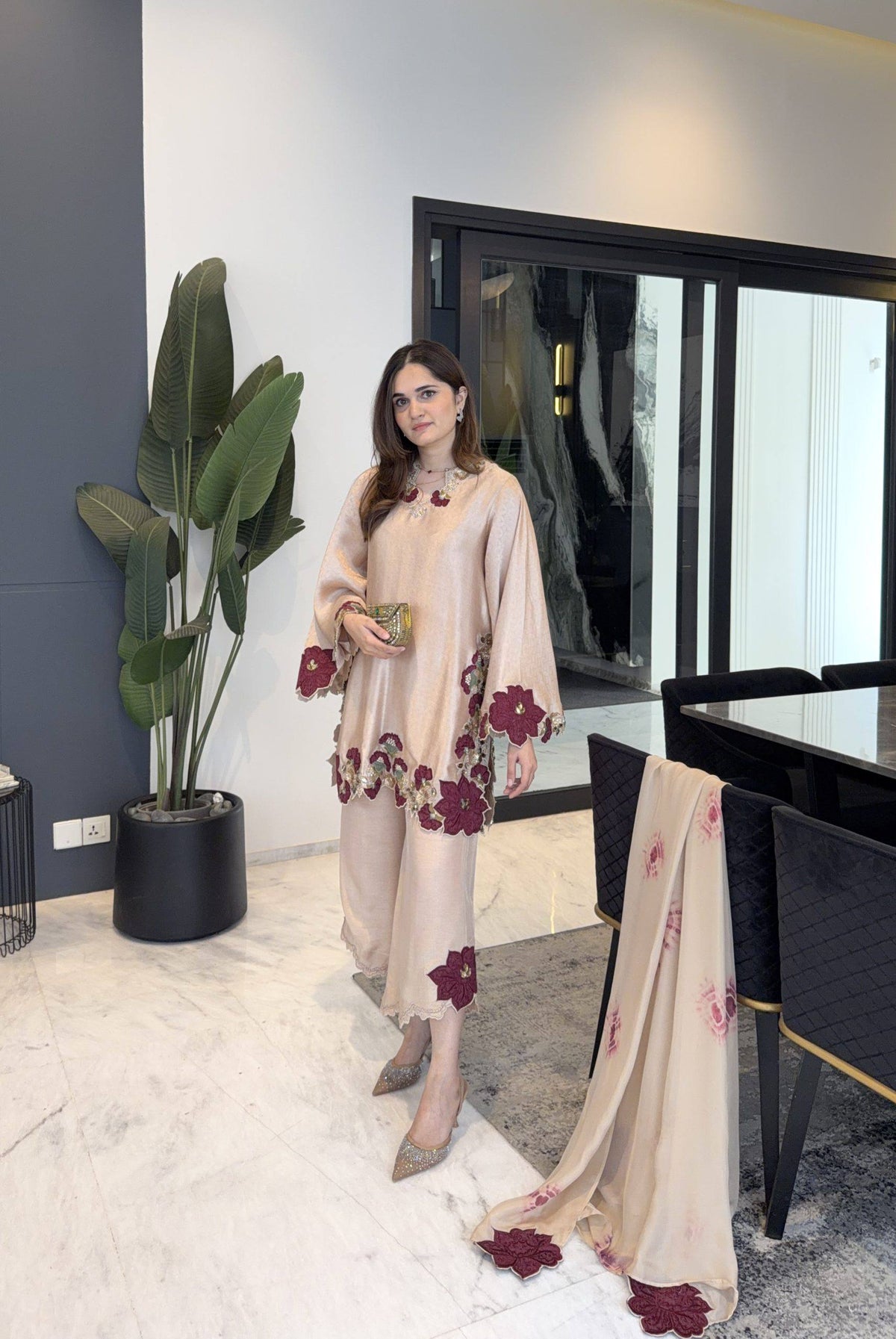 Elegant traditional outfit with floral embroidery showcasing grace, style, and modern sophistication