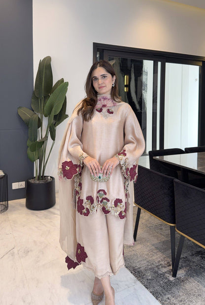 Elegant traditional outfit with floral embroidery showcasing grace, style, and modern sophistication