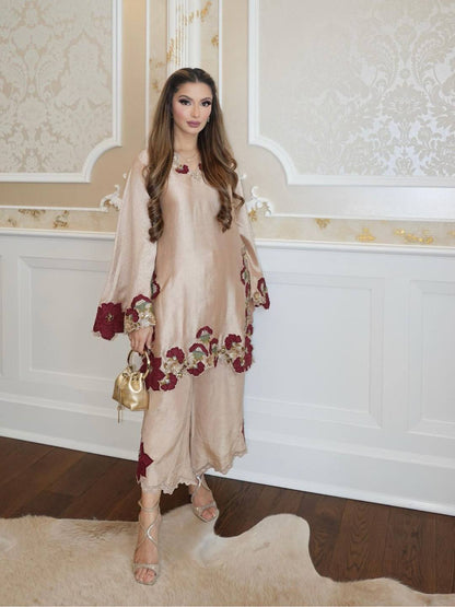 Elegant traditional outfit with floral embroidery showcasing grace, style, and modern sophistication